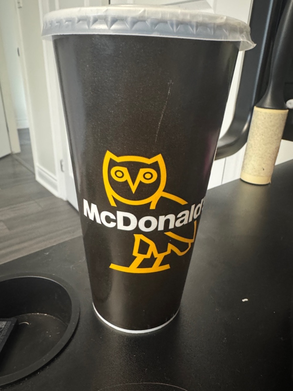 McDonald's Black Cup with Yellow Owl Logo